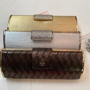 3 evening bags. Gold, silver metallic never used